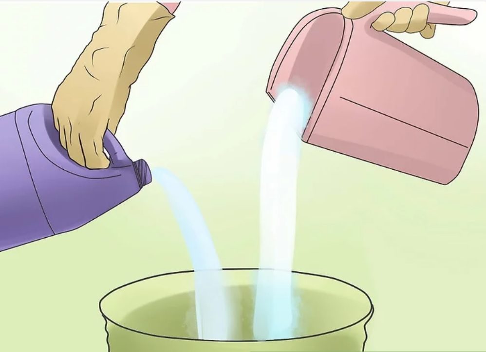 Pha thuốc tẩy để làm sạch vết mực trong máy sấy