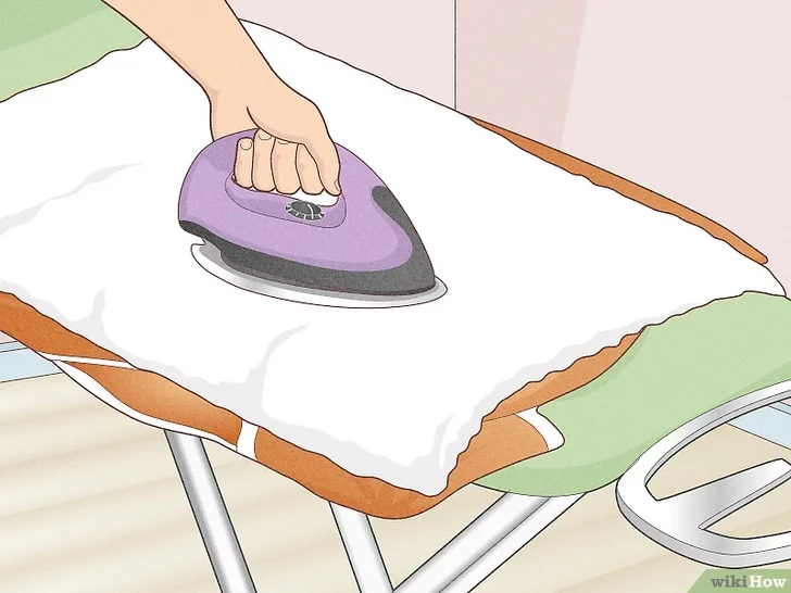 Sử dụng bàn là làm khô quần áo